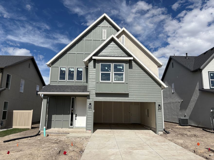 Welcome to theAUDREY, featuring the popular Swiss 4 floor plan with a charming Cottage elevation. This thoughtfully designed new construction home offers 2,406 sq ft, 4 bedrooms, and 3.5 bathrooms, with a spacious and functional layout ideal for modern living. The main level includes an open-concept kitchen, dining, and family room, while the upper level features a private primary suite, additional bedrooms, laundry, a flexible loft space, and an awesome Jack-and-Jill bathroom that adds both convenience and functionality. Carefully selected interior finishes include granite kitchen countertops, a zellige tile backsplash, warm brass lighting accents, and an elegant primary shower. A 2-car garage and quality craftsmanship complete the home. Ideally located just minutes from downtown Salt Lake City, theAUDREY provides convenient access to dining, entertainment, major roadways, and transit while still offering a neighborhood-oriented setting. Estimated completion Spring 2026. Renderings are for illustrative purposes; features, finishes, and colors may vary.