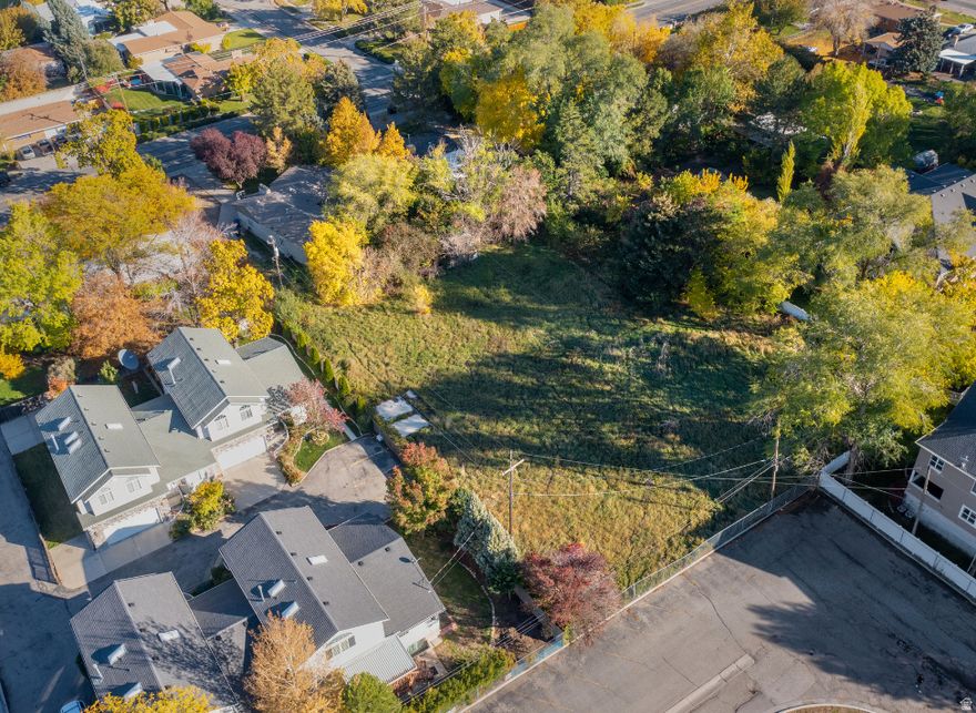 Rare opportunity to own secluded Millcreek lots, tucked away in a quiet, established neighborhood. These parcels offer exceptional privacy with mature trees and natural surroundings, while still providing quick access to parks, shopping, restaurants, and top-rated schools. Approved access to both lots is off of 1100 East, allowing for convenient entry while maintaining a peaceful setting ideal for custom home