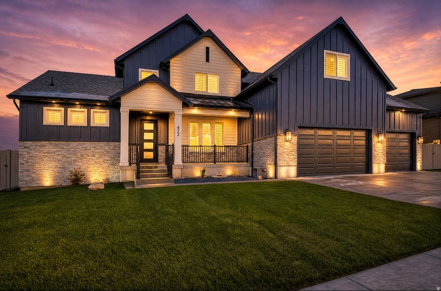 Exquisitely styled and impeccably maintained, this executive residence sits in the coveted Saratoga Springs, offering sweeping vistas of Utah Lake and the majestic Wasatch. Saratoga Springs is a rapidly growing haven, rich with refined dining, retail, highly regarded schools, scenic trails, and championship golf, all within easy reach. Newly completed in 2022, this distinguished home presents five bedrooms and three baths across more than 4,600 square feet of refined, contemporary living. The open, luminous floor plan is anchored by a main-floor primary suite, providing serene convenience and enduring luxury. Every detail reflects thoughtful craftsmanship and elegant design, from the light-filled common spaces to the well-appointed kitchens and baths. This home embodies sophistication and grace, a true gem that must be experienced in person before it finds its new owner.