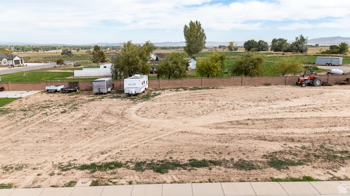 Great flat building lot with partial block wall fence in quiet neighborhood with central location and easy freeway access for a quick commute.