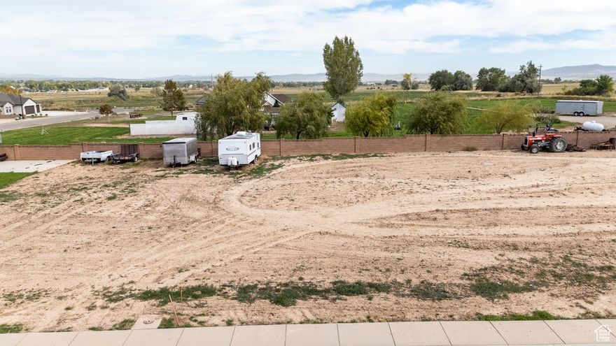 Great flat building lot with partial block wall fence in quiet neighborhood with central location and easy freeway access for a quick commute.