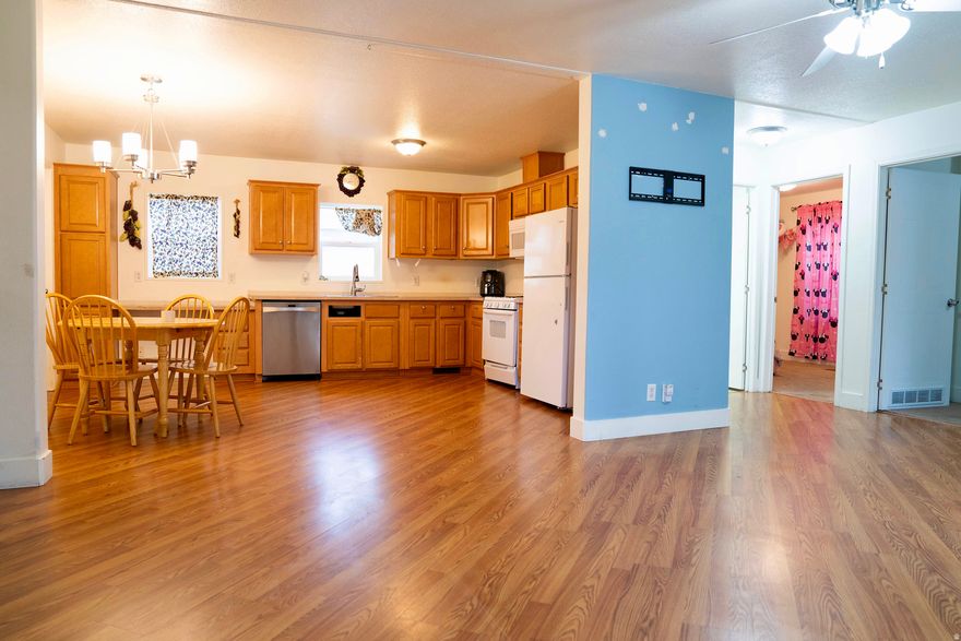 HUGE PRICE IMPROVEMENT!! Looking for an affordable housing option?  This well-maintained manufactured home features laminate flooring and carpet with an open concept! Large kitchen with plenty of storage, three bedrooms and two full bathrooms! The home also enjoys an open porch in addition to a shed for extra storage! This is a great opportunity for buyers looking to place a home on their own land. At some point, the home will need to be moved but there is no timeline yet. There will be a minimum of nine months' notification per contact at Provo City. Rental space is $500 monthly.