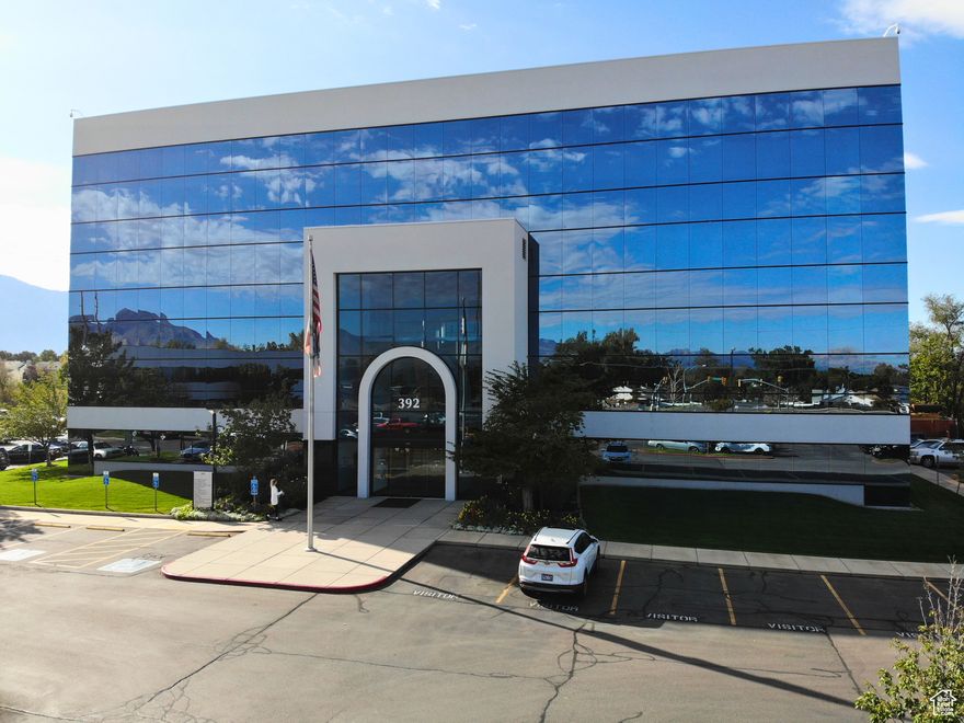 Main floor office space in a 5-story mid-rise office building. Impressive three-story atrium lobby. Unit 103 features 5 built-out offices, one kitchen/break room, and a big bull pin area. Porter service, keycard access, great security, ample parking, very well-maintained building, lots of natural light, and immediate freeway access to I-215. Several on-site restaurants and walking distance to Fashion Place Mall. This is a sub-lease space.