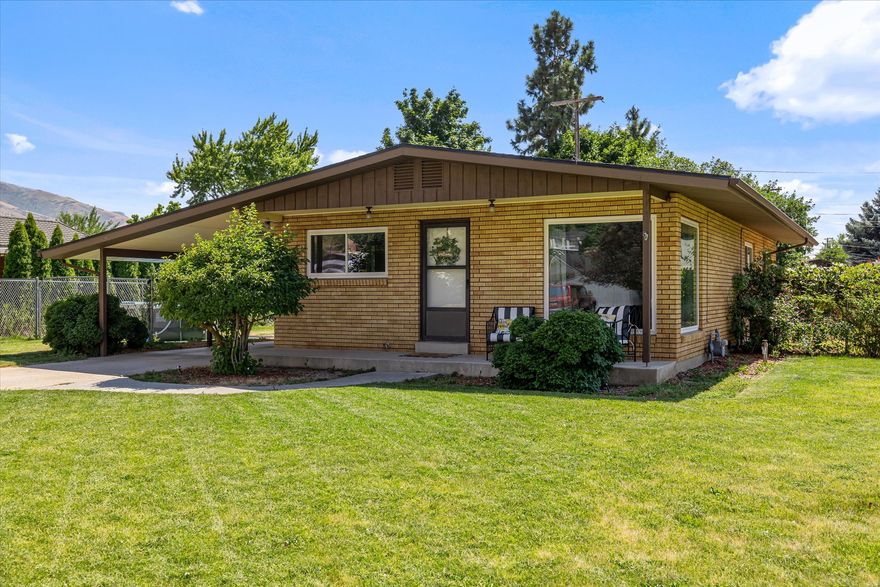 Welcome home to this beautifully updated 4-bedroom, 2-bath gem perfectly situated in the heart of Brigham City! Enjoy peaceful living paired with stunning Wasatch Front mountain views right from your doorstep.  Step inside to find new carpet, new windows, and a newer roof (just 3 years old)-giving this home fresh comfort and lasting value. The large, open-concept kitchen and living area make entertaining a breeze, while the flexible layout offers plenty of space for family, guests, or a home office.  Features include: 4 spacious bedrooms, 2 full bathrooms with updated fixtures, Open kitchen and living area, Off-street parking and additional storage, Peaceful neighborhood close to schools, parks, and shopping.  Whether you're relaxing at home or exploring Brigham City's nearby hiking trails and charming historic downtown, this property offers the best of small-town comfort with modern updates already done for you.  Schedule your showing today-homes with these views and updates don't last long!