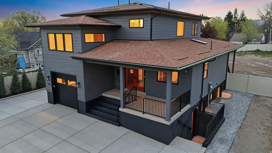 Complete March 2026 - Custom Modern Luxury in the Heart of Salt Lake City that will be complete in March, 2026. Welcome to 821 E Springview Drive, a thoughtfully designed, high-performance custom residence blending cutting-edge technology, energy efficiency, and refined modern design. Ideally located near Sugarhouse, Liberty Park, and Downtown Salt Lake City, this home offers luxury living with built-in flexibility and income potential.  Elevated Design & Smart Infrastructure 5 spacious bedrooms, including a luxurious primary suite with spa-inspired bath, separate soaking tub, walk-in shower, and expansive closet 3.5 designer bathrooms featuring radiant heated tile floors Open-concept layout with abundant natural light, high-performance windows, hardwood, LVP, and high-end tile throughout Soundproofed ceilings for enhanced privacy and quiet living Custom interior and exterior railing details Fully integrated smart systems for lighting, HVAC, sprinklers, and garage door Media network wired throughout the home Camera system wired throughout Main floor pre-wired for surround sound Radon mitigation system installed Gas line ready for backup power generator EV charger + gas garage heater  True Gourmet Kitchen Experience Designed for entertaining and everyday luxury: 6-burner professional gas range Custom cabinetry with quartz waterfall countertops Stainless steel appliances Designer lighting Wet bar with wine fridge Sliding glass doors for seamless indoor-outdoor flow  Backyard Built for Entertaining Professionally seeded backyard with sprinkler system BBQ gas line Gas line for fire pit on back patio Rough-in for hot tub Hot and cold exterior water spigots Fully wired exterior camera system  Finished Basement / ADU Flexibility The fully finished lower level is ideal for guests, multi-generational living, or additional income: Private entrance Large windows with mountain views Separate laundry Dedicated mini-split climate control Kitchenette potential Separate media package for ADU  Prime Central Location Minutes from Brickyard Plaza, Millcreek City Center, Harmons, St. Mark's Hospital, VASA Fitness, TJ Maxx, Kohl's, local dining, Downtown SLC, University of Utah, Westminster College, Park City, and six world-class ski resorts. NO HOA. Buyer to verify all information to their satisfaction.