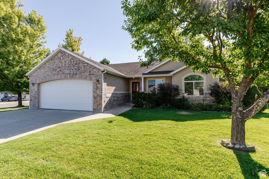 Welcome to this inviting 4 bedroom, 3 bathroom home perfectly situated in a well-maintained HOA community that takes care of your lawn maintenance and snow removal - so you can enjoy more free time and less yard work. This neighborhood is family-friendly (not a 55+ community) and welcomes residents of all ages.  Step inside to find fresh updates, including new flooring and carpet through most of the home. The thoughtful design offers main level living, so all the essentials - kitchen, living spaces, primary suite, and laundry - are conveniently located on one floor.  Enjoy the benefits of secondary water for your lawn, helping keep your yard lush and green while keeping costs down. Upstairs and downstairs living spaces provide flexibility for gatherings, hobbies, or a home office.  Whether you're looking for a low-maintenance lifestyle, room for the whole family, or a place to grow into, this home offers comfort, convenience, and peace of mind. Pets permitted with approval from the HOA.