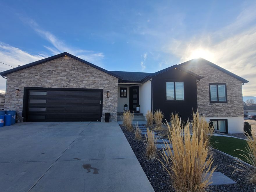 Newer single family home with some modern touches. Great corner lot, 3 car tandem garage, maintenence free yard with rock and artificial turf in the front and back yard, mature trees, water softener and on demand water heater are just a few of the amenities this house has to offer. Owner is a licensed real estate agent.