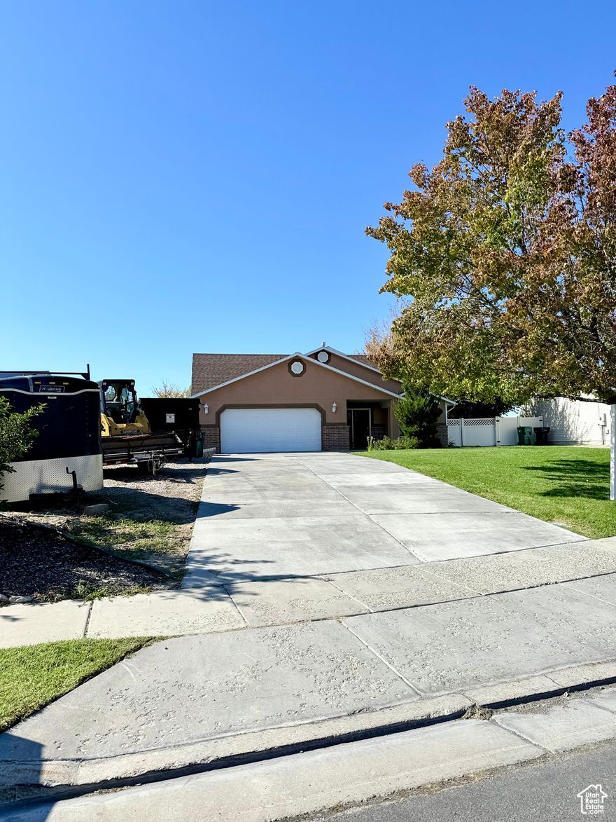 Recently remodeled and move-in ready, this spacious 5-bedroom, 3-bath home sits on a generous .71-acre lot, offering endless possibilities-including space for an ADU, workshop, or large storage. Inside, you'll love the open and functional layout designed for comfortable living and entertaining. Outside, enjoy a large yard perfect for gardening, gatherings, or simply relaxing. Conveniently located close to the junior high, elementary school, and nearby stores.