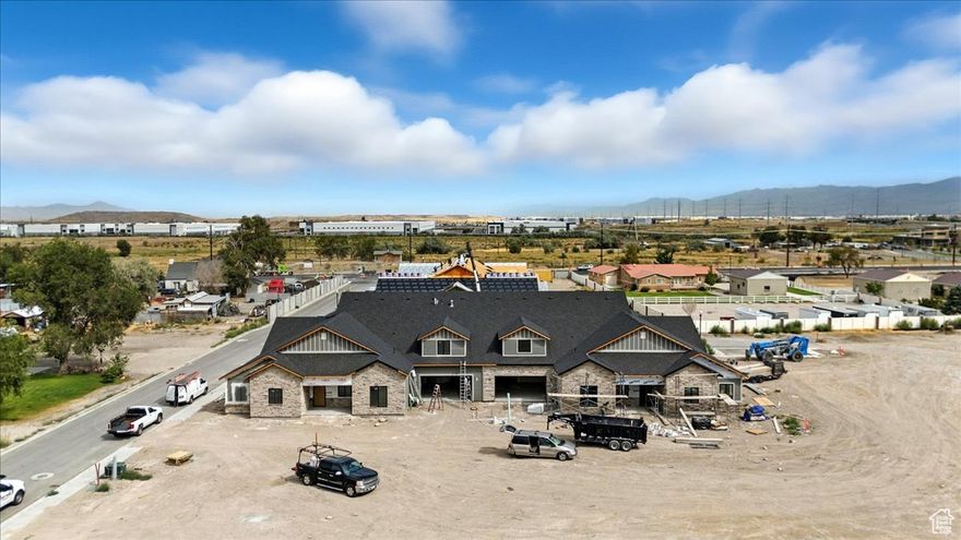 $12,000 builder incentive when you use our in-house lender on pre-builds! Ideal gated 55+ community to be built with single-level living in your own private, brand new, custom-built home with a large, extended 2 car garage with extra workspace and private yard. Each unit is designed with privacy in mind and these units have above-average efficiency features built in, including 2x6 exterior construction, 30% higher efficiency insulation, and a high-efficiency water heater. Lean into a life of leisure as the HOA maintains lawn mowing, leaf blowing, and snow removal. The community includes a full clubhouse, workout room, pickleball court, movie room and half a mile of trails. Just fifteen minutes from downtown Salt Lake City, the home is near a variety of shopping centers like Gardner Village, nearby bike trails, a two-minute drive from the Stonebridge Golf Club, and a quick ride to the Mountain View Corridor Trail (https://mountainview.udot.utah.gov/trails/). Find more info at: https://www.theheatheronparkway.com/ SF per building plans, buyer to verify.