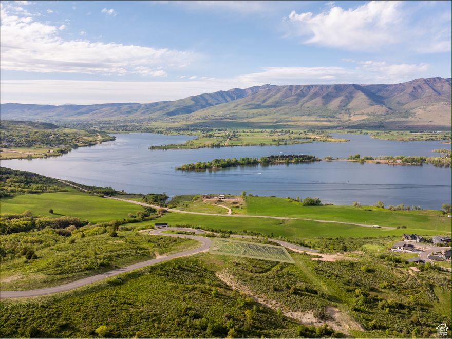 Situated on 2.28 acres in the prestigious Legacy Mountain Estates, this remarkable homesite captures breathtaking panoramic views of the lake, valley, and surrounding peaks. Perfectly positioned between the world-class Snowbasin Resort and the scenic Pineview Reservoir, this coveted community is designed to celebrate its awe-inspiring natural surroundings while offering unparalleled access to year-round adventure. Whether skiing fresh powder, exploring community hiking and biking trails, or enjoying water recreation just minutes away, every day brings an opportunity to embrace the mountain lifestyle. Ideally located in Ogden Valley, Legacy Mountain provides a rare balance of tranquility and accessibility, with seamless connections to Ogden and Salt Lake City. Fully improved and primed for your dream estate, this exceptional lot offers an unmatched setting to build a luxury mountain retreat in one of northern Utah's most spectacular landscapes. *All property information, boundaries and documents to be verified by buyer.