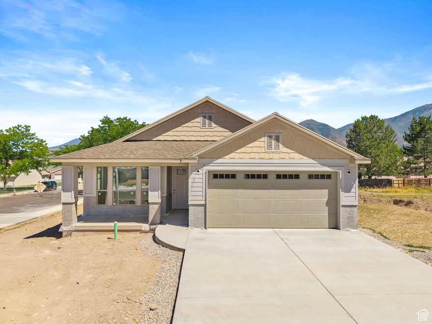 Introducing Utah County's Newest 55+ Community, Mount Loafer Flats. This thoughtfully designed neighborhood tailored for those seeking convenience, comfort, and style. Perfectly located just north of Mountain View Hospital and southeast of Payson Cemetery, this exclusive community offers the ideal blend of quiet living and close-to-everything convenience. If you've been searching for a true lock-and-leave lifestyle, a home where every detail has been taken care of, this is it. Whether you're ready to downsize or rightsize, each home is crafted with functionality and elegance in mind, featuring high-end finishes and open, accessible layouts. This model home showcases: White oak cabinetry with painted accents, custom range hood, and picture-window upper cabinets with display lighting. Gourmet kitchen with panel-ready refrigerator, double ovens, and double-drawer dishwasher. Butler's pantry and custom cabinetry in the laundry room for extra storage. Custom gas fireplace for cozy gatherings. Two master suites, each with a beautifully designed bath. Main suite featuring double sinks, heated tile floors, a spacious walk-in closet, and floor-to-ceiling custom cabinetry. Every detail has been designed for ease and comfort, from no-step entries to wide 9-foot doors and soaring vaulted ceilings. This community will offer multiple floor plans, including 2- and 3-bedroom options, all designed with single-level living in mind. This home will serve as the model home and is just 45 weeks from completion. Come tour, explore floor plan options, and choose the lot that best fits your next chapter. Buyer and buyer's agent to verify all information.