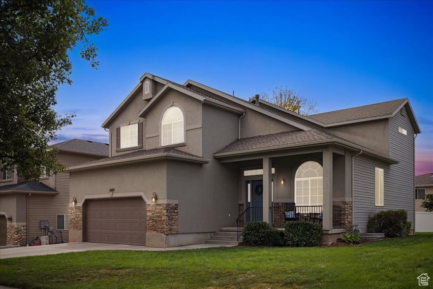 Amazing 6 bedroom, 3.5 bath home in the heart of Kaysville! This beautifully maintained property showcases timeless upgrades including travertine floors, knotty alder cabinetry, solid-surface counters, and elegant 3-tone paint. Spacious open kitchen with island and abundant storage flows seamlessly into generous living areas, including a cozy family room with fireplace and a formal living space with soaring ceilings. The master retreat features an enormous his and hers walk-in closet and spa-like bath with dual vanities. Outside, enjoy a fenced yard with lush lawn, mature trees, and a patio perfect for entertaining. Nestled in a quiet neighborhood with top-rated schools, this home offers the perfect balance of comfort, style, and convenience.