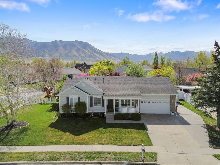 Perfectly positioned across from Woodland Park in the coveted Stansbury Park Country Club area, this beautifully updated home offers sweeping open views and a location that's hard to beat.  Step inside to discover a bright, modern interior transformed by over $15,000 in upgrades - including new LVP and carpet flooring, freshly painted white cabinetry, and brand new appliances. Thoughtful finishing touches like updated baseboards and new blinds give every room a crisp, move-in-ready feel, while a tankless water heater and radon mitigation system deliver efficiency and peace of mind.  The garage is outfitted with built-in ceiling storage, and the property includes an RV pad and storage shed - plenty of room for every hobby and adventure. Out back, a swingset and trampoline are already in place and included, making this home as fun as it is functional.  Whether you're enjoying park views from your front door or making memories in the backyard, this home truly has it all.  *Square footage figures are provided as a courtesy estimate only and were obtained from prior MLS records. Buyer is advised to obtain an independent measurement.*