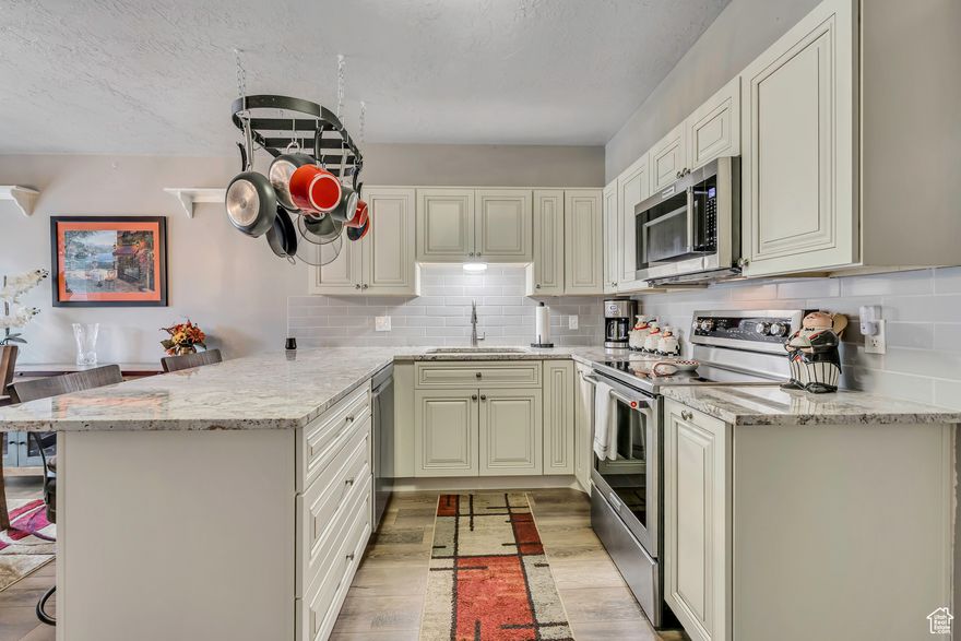 SELLER-PAID CONCESSIONS! LOCATION! PRIDE OF OWNERSHIP! CLEAN & REMODELED! When you step into this East Midvale Condo, you'll immediately feel everything that's good about it. Tucked away in the quaint Countryside development with beautiful mature trees, this 2 bedroom condo provides serene & peaceful living all around you, while the remodeled interior gives you a space to breathe and relax. Brand New Kitchen (notice the built-in hidden trash, single basin sink, etc), Fantastic Appliances (seller including ALL OF THEM), New Flooring, Updated Double Pane Windows, New Roof, New Water Heater, Updated Shower....it's been beautifully cared for and well-maintained. Huge Primary Bedroom with lots of natural light, ample closet space, and a functional floor plan. With everything Fort Union area has to offer just minutes from your doorstep, and a beautiful community to call home, don't miss out! Square footage figures are provided as a courtesy estimate only. Buyer is advised to obtain an independent measurement.