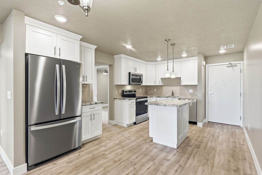 Photo of 1032 E 400 S #301B, Salt Lake City, UT 84102 (MLS # 2149888)