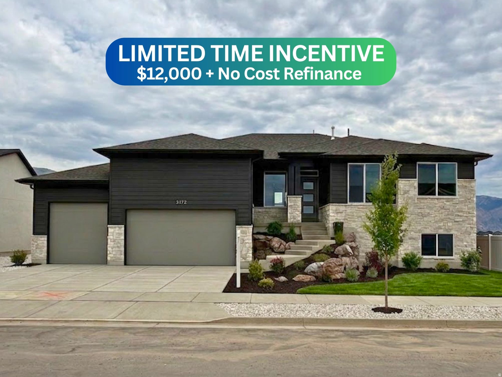 Contemporary-style exterior featuring dark horizontal siding and light stone accents