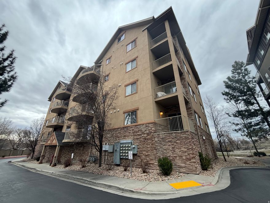 Sought after Wolf Hollow condo minutes away from hiking, biking and world class ski resorts. Amenities include club house, exercise room, swimming pool and Jacuzzi. Secured building and garage with plenty of guest parking. Open floor plan with gorgeous custom kitchen cabinets, granite counter tops, breakfast bar and open dining that leads to covered deck or great room. Large master suite includes private covered balcony with mountain views, luxurious jetted tub and separate shower, double vanity and walk in closet. Guest bedroom, full bath and laundry room complete this unit. Low maintenance and care free living at its best.