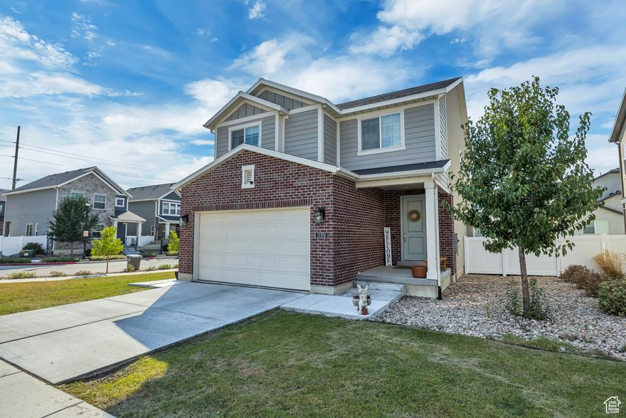 Welcome to this beautifully maintained South Jordan home that perfectly blends comfort, function, and style. Step into a bright and open concept living area with large windows and plenty of natural light. The kitchen, dining and living area flow seamlessly, making it perfect for both everyday living and entertaining. The kitchen boasts a large island, gas stovetop and oversized pantry. The property offers four spacious bedrooms upstairs and a fifth bedroom in the fully finished basement.   The fenced in backyard offers patio and green space for both play and entertaining. Perfect for summer barbecues, an evening pick up game or gardening. Located in a highly desirable neighborhood, minutes from parks, schools, shopping, and quick freeway access, this home delivers the best of South Jordan living!