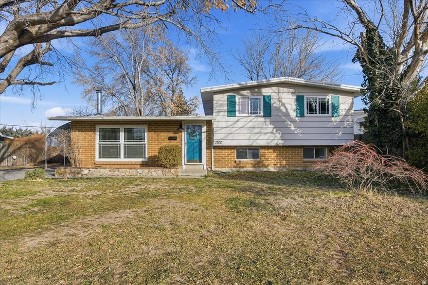 Set in a quiet neighborhood, this home offers a secluded, maturely landscaped yard-delivering the feel of a private escape while staying centrally located in the Salt Lake Valley.  The interior showcases vaulted ceilings, abundant natural light from large windows, a kitchen bar for additional seating, a cozy fireplace, and a private primary suite. Recent updates include new carpet, LVP flooring, paint, and trim throughout the upstairs and basement, along with a new dishwasher. The roof and AC unit were replaced in 2021.