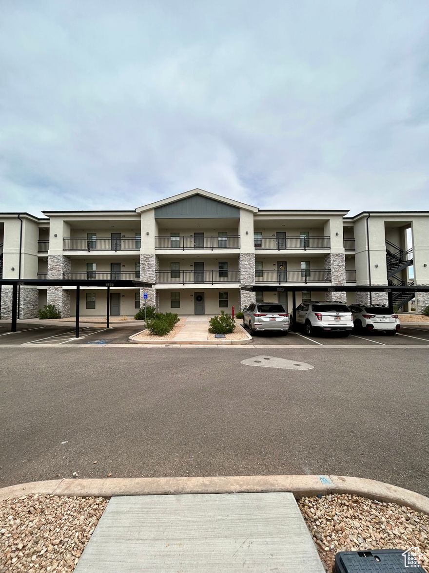 Brand New Feel, Immaculate 3rd Floor Condo!  This stunning third-floor end unit condo feels like new construction and has been barely lived in! Located in a prime Washington location, it offers easy access to I-15, city amenities, and is close to parks and Pickleball courts.  Enjoy vaulted ceilings that create an open, airy feel, and tinted windows throughout the home to help keep it cool and energy-efficient. The condo also includes covered parking for your convenience.  With modern finishes and a well-maintained interior, this home is truly move-in ready.  Don't miss this exceptional opportunity to own a low-maintenance home in one of Washington's most desirable areas!