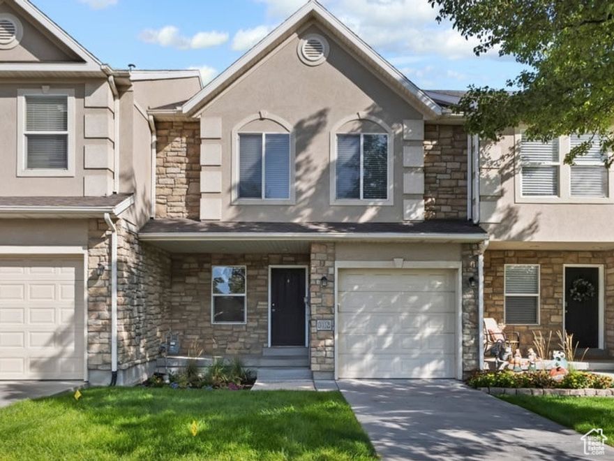 You'll fall in love with this neighborhood-and your new home! This bright and spacious 3-bedroom, 3.5-bath townhome offers comfort, style, and room to grow. The open main floor features gleaming hardwood floors and large family room, perfect for gathering and entertaining.  Your primary suite is a true retreat, complete with a generous walk-in closet, double vanity, luxurious soaking tub, and separate shower. The finished basement includes a full bathroom as well as a large room that could be a 2nd family room or a guest suite complete with a gas fireplace!   Enjoy a prime location close to Jordan Landing's shopping and dining, with quick access to Bangerter Highway and Mountain View Corridor. With schools just minutes away, this home combines convenience and comfort in one perfect package.