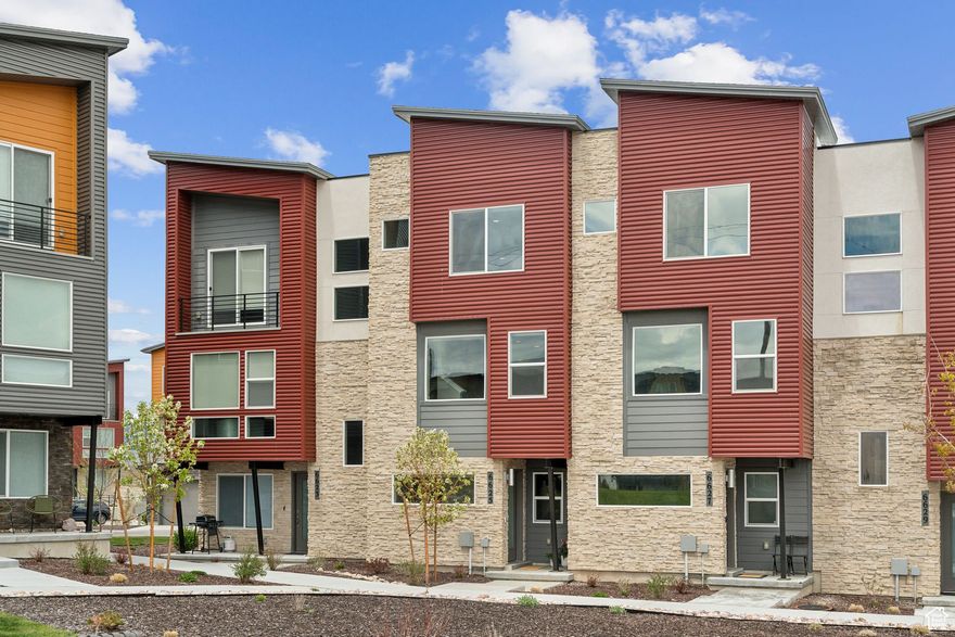 Minutes from the new Deer Valley East Village-own a model townhome at an incredible price!** 6625 Mountain Alder Lane is an impeccably maintained 3-bedroom, 3-bath home in the thriving Silver Creek Village community. Just 15 minutes from Park City and Deer Valley Resorts, this residence combines upscale finishes, smart home features, and a low-maintenance lifestyle. Enjoy real hardwood laminate floors, 9' ceilings, and quartz countertops throughout. The kitchen includes a center island and high-end appliances from KitchenAid, LG, and Kohler. Two upstairs bedrooms feature private en suites; a third bedroom and full bath on the main level offer additional flexibility. Additional features include: water softener, on-demand hot water circulator, Smart OnGuard system with remote access, fiber internet wiring, and professional window treatments. Views of the mountains and resort can be seen from multiple angles. The home faces a quiet, landscaped park. One-owner, smoke- and pet-free, and **short-term rental approved** (never rented). Easy access to Salt Lake City, Old Town Park City, ski resorts, and trail systems. Square footage figures are provided as a courtesy estimate only and were obtained from the county assessor. Buyer is advised to obtain an independent measurement.