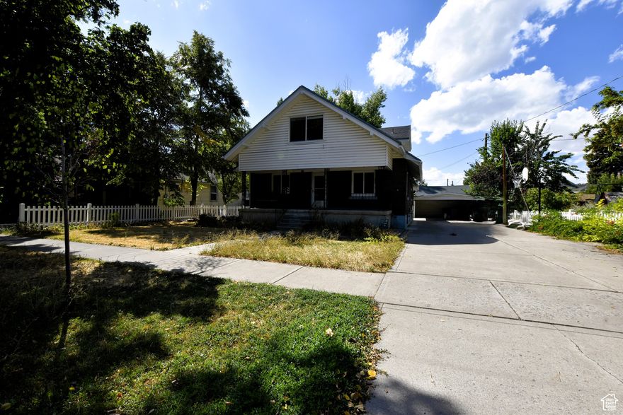 You'll love the size and space of this classic home in the heart of Logan. There is a second kitchen in the basement for all your baking needs. This home has beautiful craftsmanship with tucked in doors with classic charm. You'll love the extra outside sheds and garage for all your storage needs. Home is a single family home and not grandfathered for a basement apartment per Logan City.  Square footage figures are provided as a courtesy estimate only and were obtained from County Records.  Buyer is advised to obtain an independent measurement.