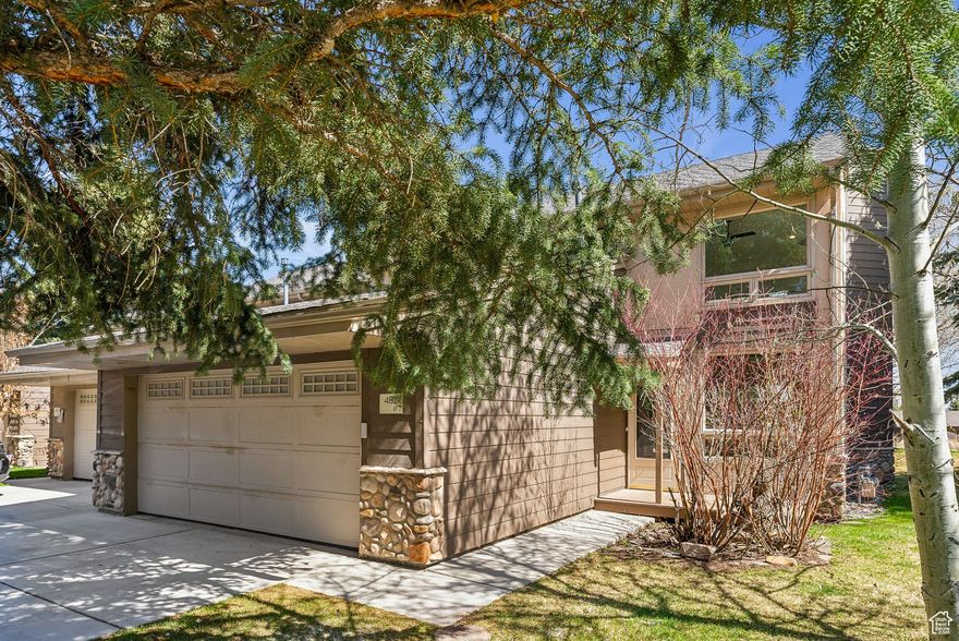 Welcome to 4824 Meadow Loop Road #7 - a beautifully remodeled end-unit townhome located in one of Park City's most sought-after neighborhoods, prized for its proximity to Canyons Resort, Kimball Junction, and endless year-round recreation. This 2-bedroom, 2.5-bathroom retreat offers a rare blend of modern upgrades, serene outdoor living, and unbeatable access to nature. Backed by the scenic Willow Creek Trail, the home's lush backyard is a true summer sanctuary, complete with a gentle brook and a southeast-facing patio perfect for evening entertaining. Inside, no detail has been overlooked. The home boasts brand-new hardwood flooring on the main level, fresh carpeting upstairs, all-new bathrooms, and tasteful window treatments throughout. The fully upgraded kitchen features all-new appliances and finishes, offering both style and functionality. Additional upgrades include a new washer, and water heater. Two cozy fireplaces-one in the living room and one in the primary suite-add warmth and charm. Whether you're looking for a full-time residence or a seasonal escape, this move-in-ready home combines convenience, style, and natural beauty in a truly special setting. All information herein is deemed reliable but is not guaranteed. Buyer is responsible to verify all listing information, including square feet/acreage, to buyer's own satisfaction.