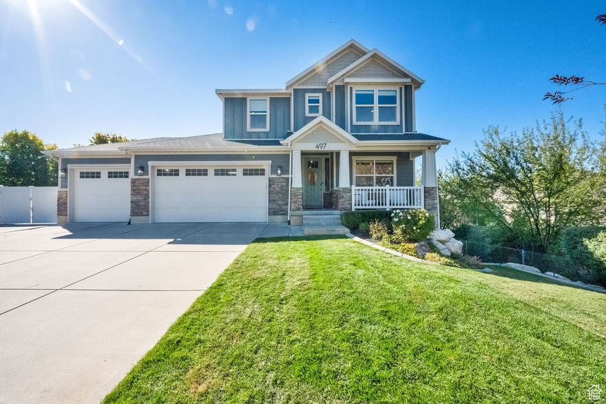 Welcome to this beautifully crafted 6-bedroom, 3.5-bath home tucked in a quiet cul-de-sac in Bountiful. Designed for comfort and function, this home features a main-floor master suite with a free-standing tub, dual showers, and barn door accents. The gourmet kitchen includes double ovens, a farmhouse sink, built-in desk, and large pantry.   Upstairs you'll find a spacious loft, two bedrooms with walk-in closets, and a full bath. The walk-out basement is sure to impress with 9' ceilings, a second laundry room, three additional bedrooms, a full bath, cold storage, and plumbing for a future kitchen-perfect for rental potential or multigenerational living.  Enjoy the ideal blend of modern amenities and cozy living with plenty of space for entertaining or family time. The outdoor area is beautifully finished with a hot tub-ready setup, epoxy garage floors, RV parking, a 3-car garage, and a covered porch. Conveniently located near schools, shops, and scenic surroundings.  Don't miss your chance to call this beautiful home yours!