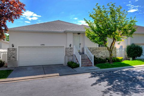 Photo of 5991 S ORIGIN PL, Taylorsville, UT 84123 (MLS # 2158087)