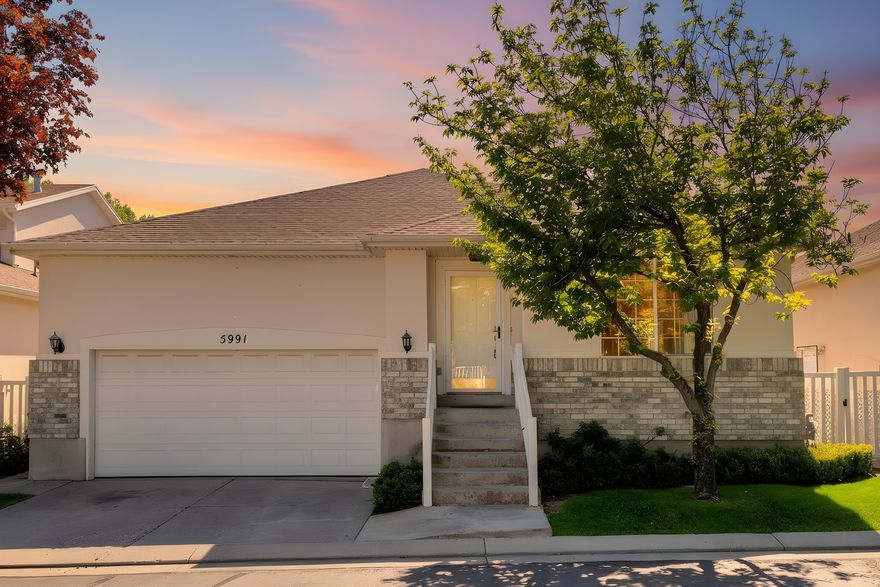Stunning Fully Renovated Rambler in Prime Gated Location Near I-215! Beautifully updated 5-bedroom, 3-bath home located in a highly desirable gated community with quick access to I-215, shopping, restaurants, theaters, schools, hospitals, and everyday conveniences. This spacious move-in-ready home features a fully renovated main kitchen plus a second kitchen in the basement, offering flexible living space ideal for multi-generational living or entertaining. Major renovations and upgrades include fully remodeled kitchens with soft-close cabinetry and granite countertops, updated bathrooms with upgraded showers and new cabinetry, new flooring throughout the main level, new basement carpet, new roof (2024), fresh exterior paint (2023), new HVAC and A/C system (2023), brand new interior paint (2026), new deck (2026), new water heater (2026), and updated light fixtures throughout. All appliances included, including washer, dryer, newer kitchen appliances, and new stove and washer (2025). Enjoy HOA amenities including gated access, pool, hot tub, playground, snow removal, front landscaping maintenance, sewer, trash, basic cable, internet, and common area maintenance. Rare opportunity to own a beautifully upgraded rambler in one of the area's most convenient locations!