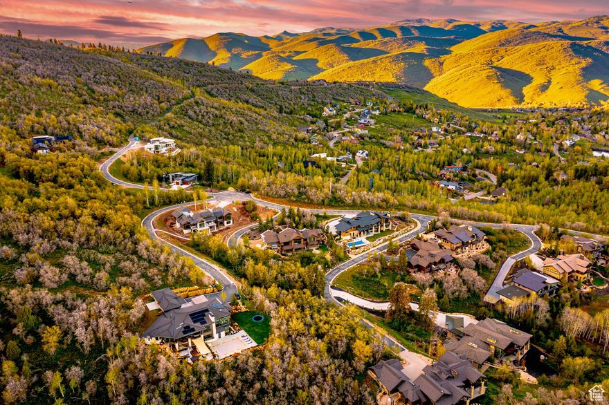 READY TO BUILD WITH PLANS on the lowest-priced gated community lot in the Park City school district.    This .6-acre estate lot in The Woods of Parleys offers a rare opportunity to create your mountain retreat in one of the area's most exclusive gated enclaves.    Set at the end of a quiet road, the property combines unmatched privacy with panoramic views of Park City's Murdoch Peak. The 192-acre community is a sanctuary of forest, wildlife, and 4.5 miles of private walking and biking trails-yet it's only minutes from both Park City and Salt Lake City.    All utilities are already on-site, and custom home plans are prepared and ready for submission to the HOA. The groundwork is in place to bring your vision to life with ease.    This property delivers elegance, seclusion, and convenience in one-and at a price point that makes it a standout opportunity in the Park City market.