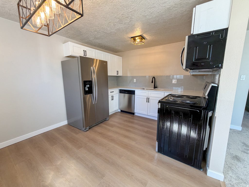 Photo of 647 E SWENSON AVE S #1, Springville, UT 84663 (MLS # 2185213)