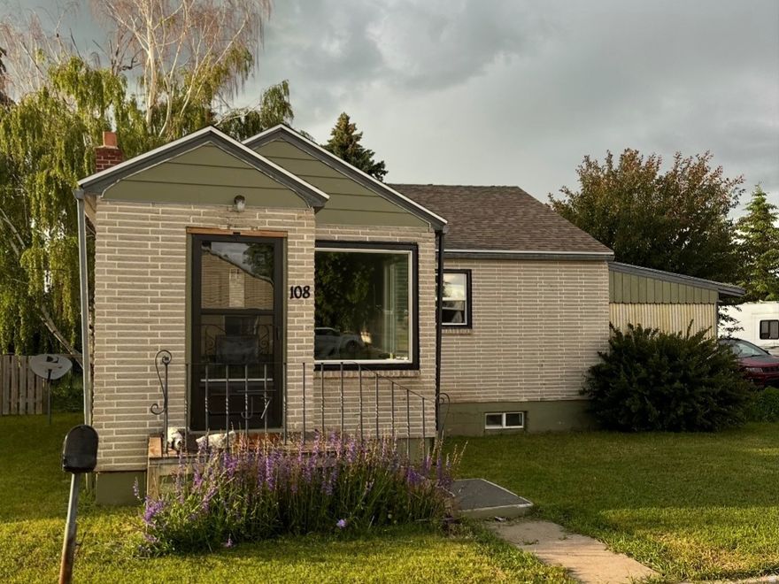 Welcome home to this beautifully remodeled gem right in the heart of Grace, Idaho! The spacious living room is warm and welcoming, complete with a cozy fireplace and large bay windows-the perfect spot for your Christmas tree or soaking in peaceful small-town views. The home offers three official bedrooms plus a versatile fourth room that could be used as an additional bedroom, home office, or playroom. You'll love the dedicated laundry room and ample basement storage, giving you plenty of space to stay organized. Step outside to enjoy the large fenced backyard, shaded by mature trees-including a magical, sweeping weeping birch that makes the yard feel like a storybook retreat. The covered back porch is perfect for quiet mornings or evening gatherings, and a small detached garage provides convenient parking or extra storage. Living in Grace means peace, safety, and a true sense of community.