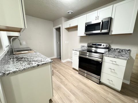 Tiny photo for 702 N COWLEY ST, Layton, UT 84041 (MLS # 2125880)