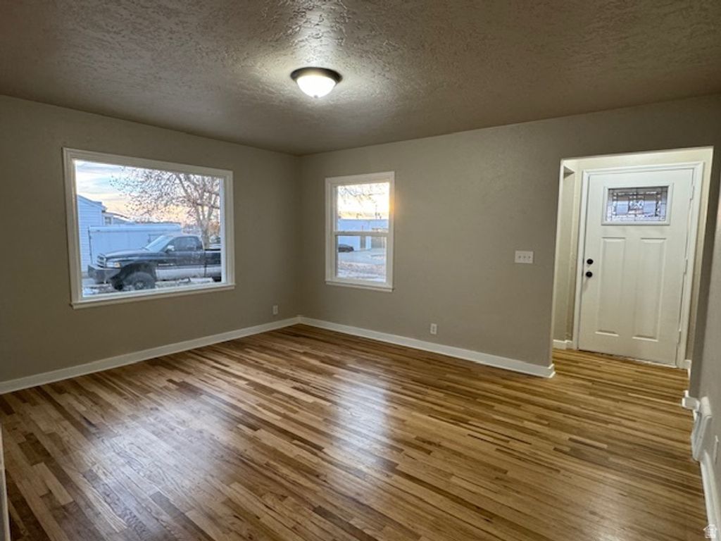 Photo of 702 N COWLEY ST, Layton, UT 84041 (MLS # 2125880)