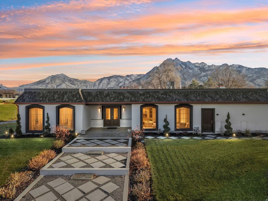 GRAND OPENING | OPEN HOUSE | JANUARY 17 | 11AM-2PM | Welcome to this beautifully remodeled home in the heart of Holladay, offering breathtaking mountain views. Ideally located just minutes from world-class ski resorts, downtown Salt Lake City, and an abundance of dining and retail options. This home has been thoughtfully renovated from head to toe with high-end finishes at every turn. Features include premium LVP flooring, custom white oak cabinetry, high-end built-in appliances with a large wine and beverage cooler, quartz countertops and backsplash, and luxurious fixtures throughout. Enjoy two fireplaces and motorized window coverings that add both comfort and sophistication. The spacious primary suite is a true retreat, complete with a private sitting area, direct access to the backyard, a serene spa-like bath, and a large custom walk-in closet. Step outside to an exceptional outdoor living space featuring a Trex deck, pergola, outdoor fireplace, and hot tub, perfect for relaxing or entertaining. Important upgrades include a new roof (presidential shake shingles. Shake are 3x the price and thickness), new HVAC system, new tankless water heater, water softener, main water line connecting to the city was replaced,  all water lines replaced, all new plumbing fixtures, and updated electrical. Homes of this caliber rarely come available in this prime location, this is one you won't want to miss.