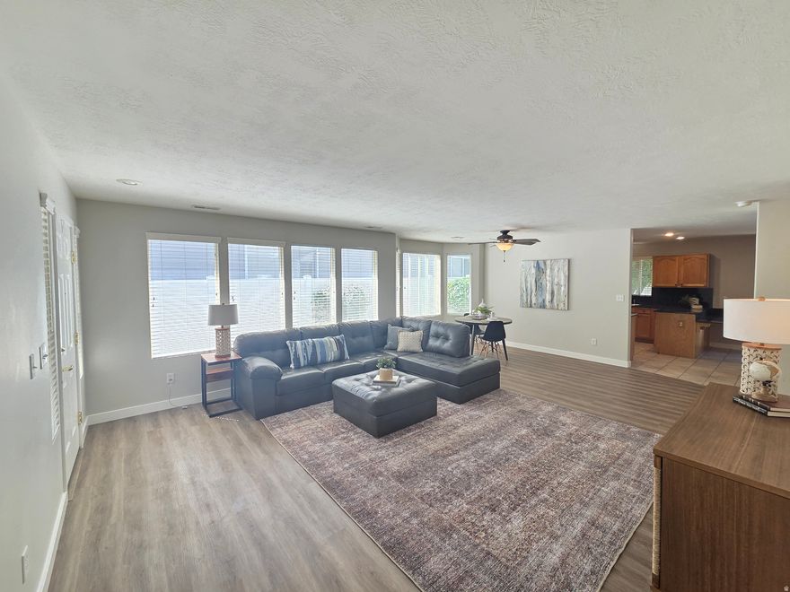 AMAZING PRICE FOR THIS SINGLE LEVEL RAMBLER WITH NO STEPS! Large living room great for entertaining | Beautiful kitchen with granite countertops, stainless steel appliances, corner pantry, and large dining room with cozy gas fireplace! | Primary suite features ensuite bath with granite countertops, double sinks, separate tub/shower, & large walk-in closet | Second bedroom on opposite end of the house is across from another full bathroom with granite countertops | ALL APPLIANCES INCLUDED! | Great storage in garage & back shed | Quiet, gated community with beautiful landscaping | Front landscaping is included in HOA dues. Back can be added for an additional cost | Awesome central location with easy freeway access | EASY TO SHOW!