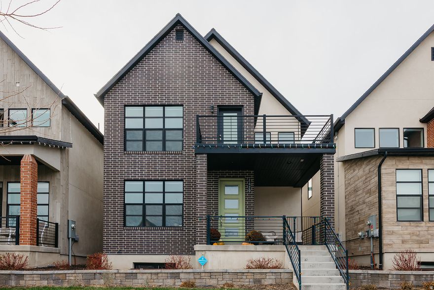 **Join us for an Open House on February 21st from 11:00 AM1:00 PM to experience this stunning home in person. Filled with sunlight and framed by expansive windows, this Holbrook Farms home offers a warm and uplifting living experience from the moment you step inside. A spacious covered front porch welcomes you in and creates the perfect place to unwind and connect with the neighborhood. The open main floor features custom lighting, quartz countertops, a tile kitchen backsplash, stainless steel appliances, generous storage, and seamless flow for everyday living and entertaining. Upstairs, the primary suite includes a large private deck with beautiful sunrise and mountain views, a double-sink granite vanity, separate soaking tub, walk-in shower, and a spacious walk-in closet that connects directly to the laundry room for added convenience. Two additional bedrooms share a full bath. The finished basement extends the living space with room for movies, hobbies, or a play area - complete with a theater projector and screen included - along with a large storage room. Enjoy a maintenance-free yard managed by the HOA and resort-style community amenities including a pool and clubhouse just 50 yards away. Located near parks, trails, a playground and basketball court steps away, and the new 33-acre Holbrook Park two blocks down the road. Minutes from Primary Children's Hospital, the Jordan River Trail, major commuter routes, Silicon Slopes, shopping, and dining.