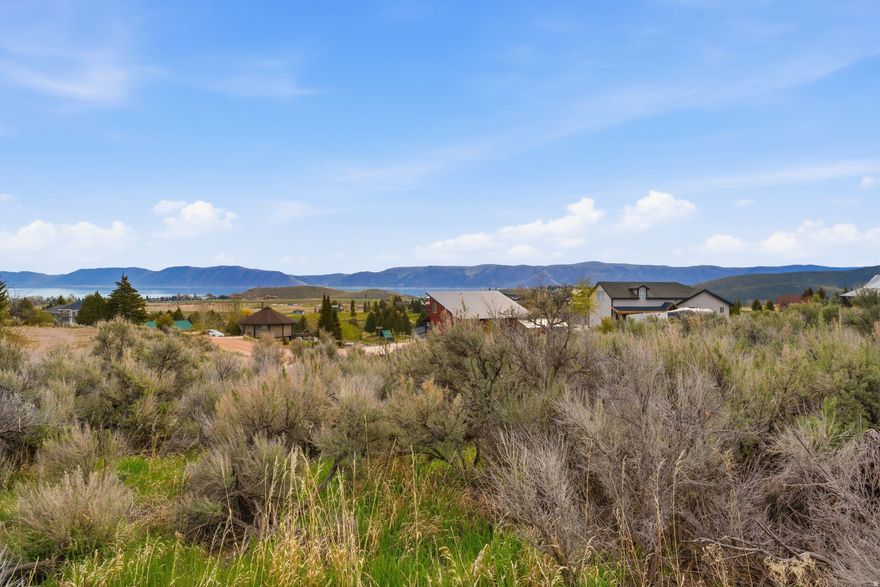 Build-ready lot in a quiet Garden City cul-de-sac. Enjoy beautiful, unobstructed lake views in a private setting. Utilities nearby with access to Ideal Beach and its amenities, plus direct entry to Cache National Forest. Year-round access and short-term rentals are allowed-an excellent opportunity to build your dream home or getaway.