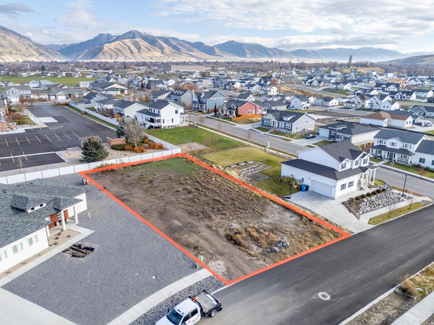 LOT 82 Mount Sterling Farms is a picturesque community located in Hyrum, Utah. This community has the best in homes, parks, and views. One of the parks has a splash pad, pickleball and basketball courts!  Mount Sterling Farms offers homeowners a chance to escape the busy, fast-paced city life, and live where kids can spend their days playing outside with friends at the park or on the splash pad. There's a lot to do in your own neighborhood, and there are many different types of outdoor recreation just minutes away! If you are looking to build a new home in Hyrum, you will find everything you are looking for in this exclusive neighborhood.