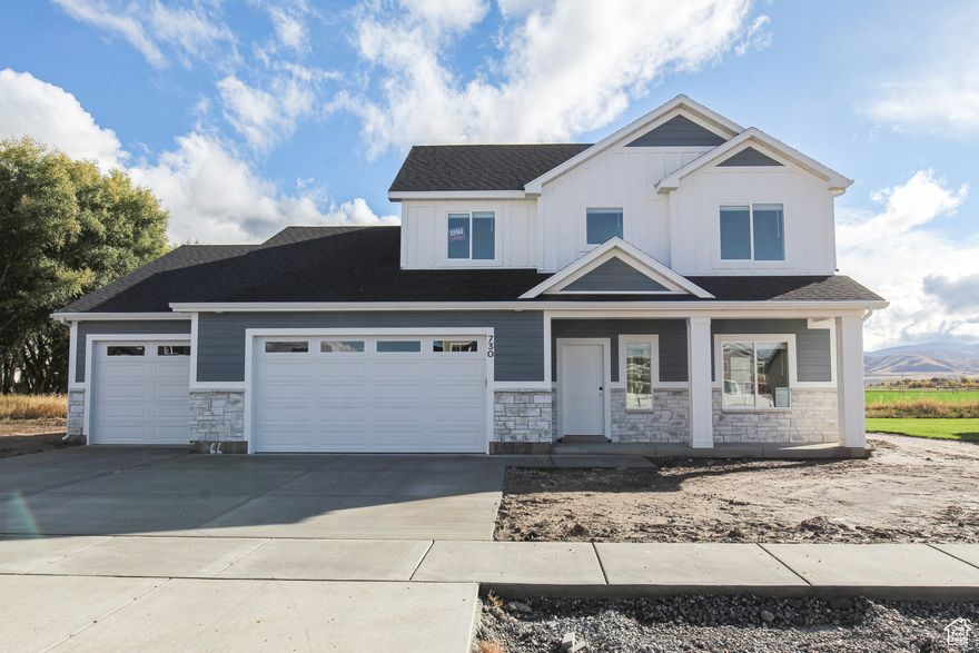 Save 4% on this home! That is over $20,000 to use towards rate buy down, closing costs, or even purchase price reduction. Offer expires Jan 16th at 5pm. Don't miss out on this amazing Magnolia on a large lot in Hyrum, UT. This home features so many must haves- 4 car garage, so many rooms with multiple possibilities, and most important MASTER ON THE MAIN! You'll love having the option of an office on the main leveling area and enjoy multiple upgrades throughout the home. Tile backsplash in the kitchen, ceiling fans in the master, and black hardware throughout. Don't forget to bring the toys with the 4 car garage.