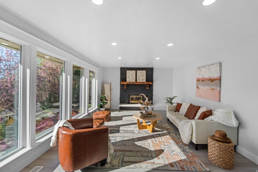 Enjoy breathtaking views overlooking Oakridge Country Club in this ideally located home-just minutes from Lagoon, Station Park, shopping, dining, and entertainment. Situated in a beautiful neighborhood with mature trees and stunning mountain scenery, and within top-rated school boundaries. The home features numerous updates including new flooring, carpet, windows, and kitchen cabinetry. The open great room showcases a beautiful waterfall granite island. The lower level is designed for entertaining with space for billiards, a wet bar, and a theater room. The primary suite offers two private decks with incredible views of Oakridge Country Club and the surrounding mountains. Additional highlights include a brand-new epoxy garage floor and front-row views of the Oakridge 4th of July fireworks from your own deck and porch. We dropped the price for a quick sale!