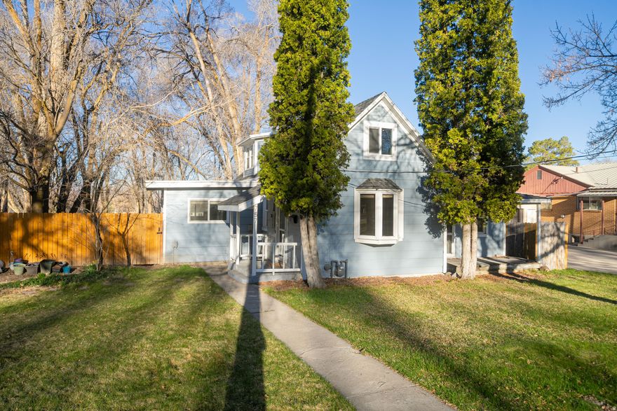 This well-maintained and charming home has been thoughtfully updated, offering 3 bedrooms and 1 bathroom with an ideal blend of character, functionality, and opportunity. Situated in a quiet, established neighborhood, the property enjoys a convenient location near schools, parks, and community amenities-making it well-suited for a variety of lifestyles. Whether you're a first-time buyer or seeking a smart investment to build equity, this home provides flexibility and value without exceeding your budget. Inside, you'll find tasteful updates throughout, including a refreshed kitchen filled with abundant natural light. The functional layout offers versatile living options, ideal for growing households, rental potential, or creative use of space. Recent improvements include a newly updated perimeter fence with cedar and cemented posts, a 200 sq. ft. attic addition, new water line plumbing for shower and bathtub, a new sewer line for outgoing water, and an updated electrical fuse box. Additional enhancements include updated outlets and ceiling lighting in the second bedroom, along with new smoke detectors and light fixtures for added comfort and peace of mind. Outside, mature trees enhance the property's charm, providing shade and inviting curb appeal. With no HOA and room to grow, this home presents a rare opportunity to enjoy both comfort and long-term potential. Square footage figures are provided as a courtesy estimate only and were obtained from the county records.  Buyer is advised to obtain an independent measurement.