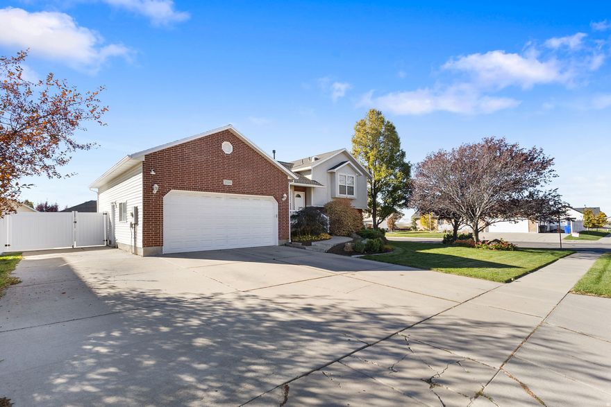 **THIS HOME IS FEATURED ON UTAH'S REAL ESTATE ESSENTIALS - CLICK THE VIRTUAL TOUR TO VIEW THE SEGMENT** Now this is a great find!  Situated perfectly within 5 minutes from a grocery store, and walk-ability to the nearby elementary and Jr. High school, you can enjoy everything the area has to offer - including the city park around the block!  Inside the home is even more to love with the multiple living spaces all centrally located to entertain loved ones, and even versatile spaces in the basement that could be utilized as play rooms, a home office, or bedrooms.  Plenty of storage space.  Central vac and an audio system only amplify the convenience of this property. Enjoy peace of mind in your ownership with new kitchen appliances and internal appliances throughout. Fresh paint, a roof in excellent condition, and a fenced yard leave nothing for the new owner to do besides relax and relish in their perfect home.