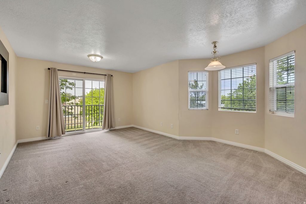 Photo of 3185 S MATISSE LN W #F7, West Valley City, UT 84119 (MLS # 2153639)