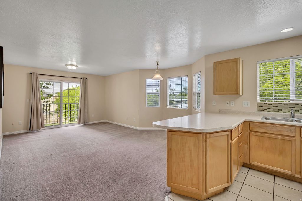 Photo of 3185 S MATISSE LN W #F7, West Valley City, UT 84119 (MLS # 2153639)