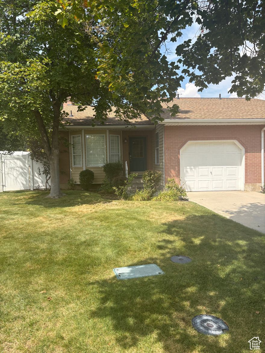 This cozy twin home has been well-kept and updated with beautiful finishes. This end unit features a vaulted ceiling, plantation shutters, granite countertops and loads of natural light. The basement has been updated with recessed can lighting and flooring. Basement was tastefully designed to please all.  Nestled in a quaint neighborhood with wonderful neighbors, this home enjoys mature trees and landscaping which the HOA maintain. Enjoy summer evenings in your landscaped, fully-fenced backyard which offers plenty of space for playing or unwinding. The community also boasts a private park, providing a tranquil space for picnics, leisurely strolls, or playtime with family and friends.