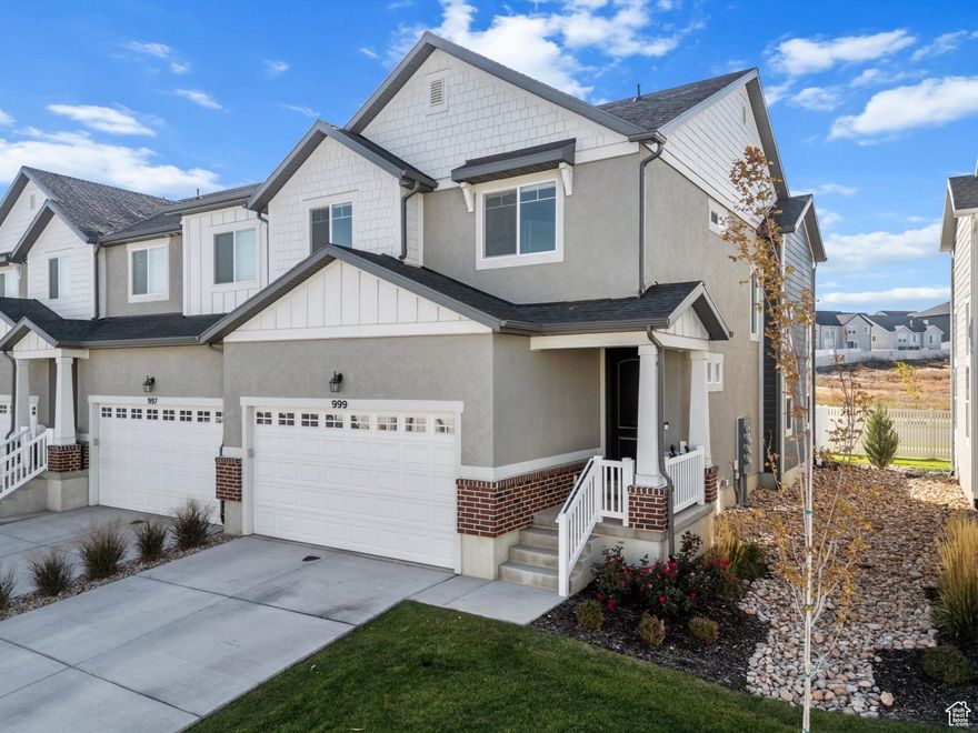Built in 2023, and priced to sell, this end-unit upgraded Saratoga Springs townhome nails that modern, comfortable vibe. big windows, natural warm light, and vaulted open to below great room make the whole place feel fresh and airy. The kitchen is a total win with quartz counters, sleek finishes, upgraded fixtures and an island that's basically the heart of the home with trendy forest cabinets. You'll find 3 spacious bedrooms upstairs, including a primary suite that's private with a large bathroom, double sinks, large shower, and a grand walk-in-closet! Fenced-in yard with a gate to an HOA-maintained grassy area. The neighborhood has parks, trails, playgrounds, a community pool, and more. Easy access to Costco, Walmart, and more.  Move-in ready, low-maintenance, and just the right mix of style and chill. Buyer is responsible to verify square-footage and all information.