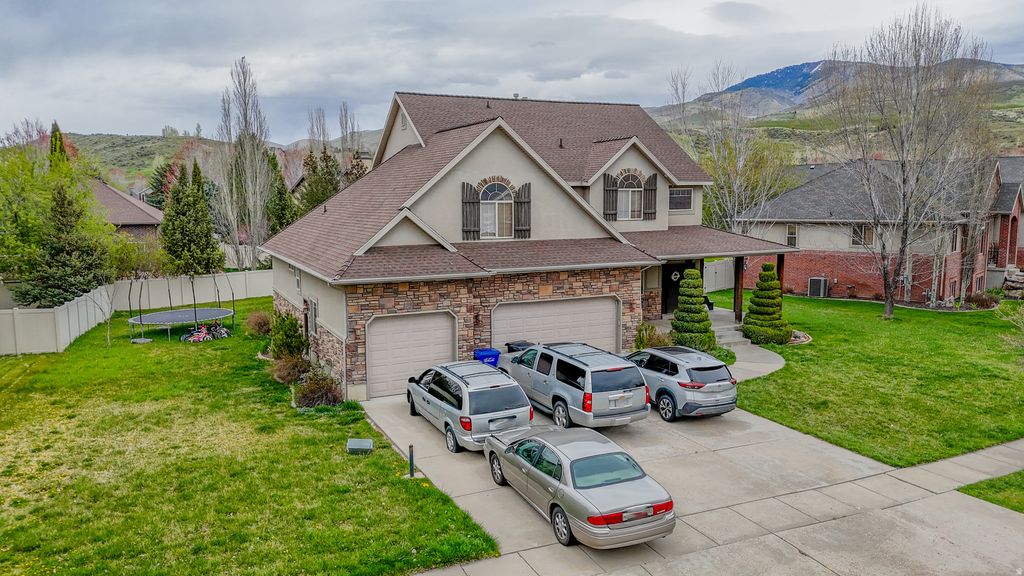 Photo of 4036 W IVY AVE, Mountain Green, UT 84050 (MLS # 2153220)